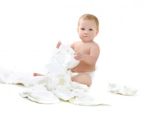 cute baby with diapers over white