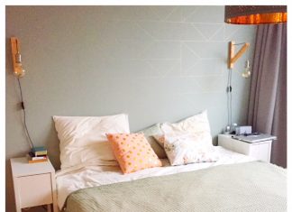 Ruimtelijk en stijlvol wonen in een klein huis slaapkamer opgemaakt bed